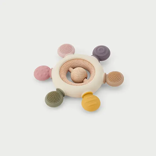 Ontdek de Tickit SiliSoft bijtring Aarde: zacht siliconen en natuurlijk hout voor kleine handjes. Fijn bijtspeelgoed én babyspeelgoed.